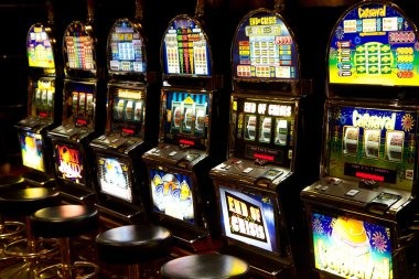 Tarung Mesin game interface with reels and symbol paytable on hantuslot